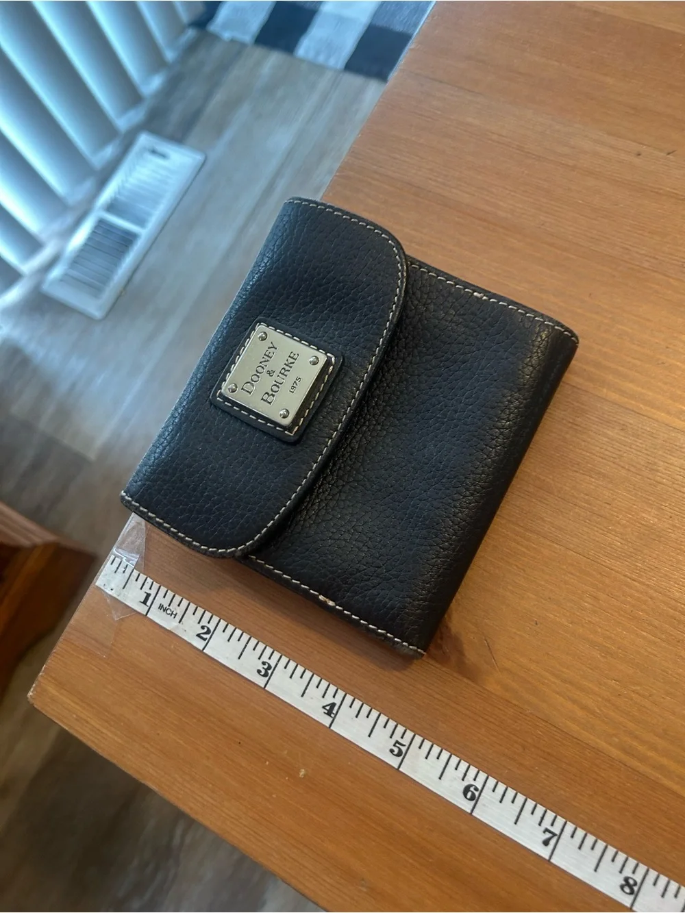 Dooney & Bourke Black Leather Fold Wallet with Logo Plaque